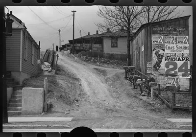 [Untitled photo, possibly related to: [Posters covering a building…, 1936