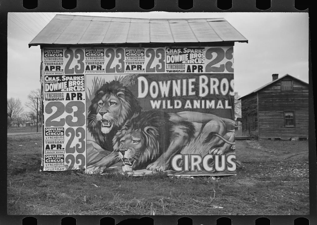 [Posters covering a building near Lynchburg to advertise a Downie…, 1936