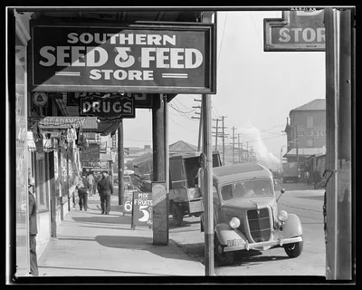 Photograph from Louisiana: Waterfront in New Orleans. French market sidewalk…