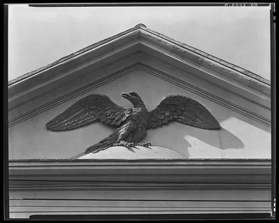 Photograph from South Carolina: Gilded pediment eagle. Charleston, South Carolina