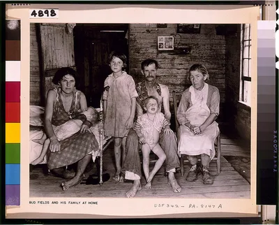 Bud Fields and his family at home, Alabama, Hale County, 1936